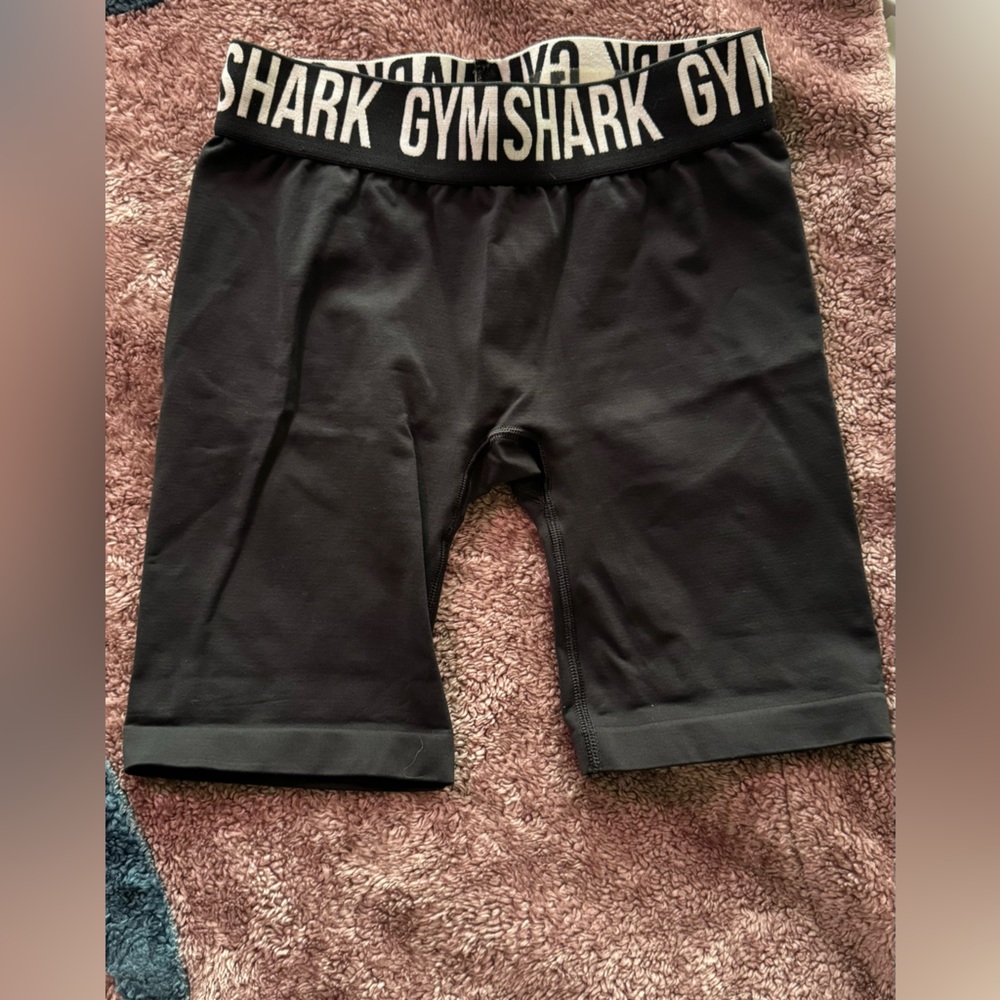 Gym shark shorts with elastic no-slip waistband. Black. Size small.